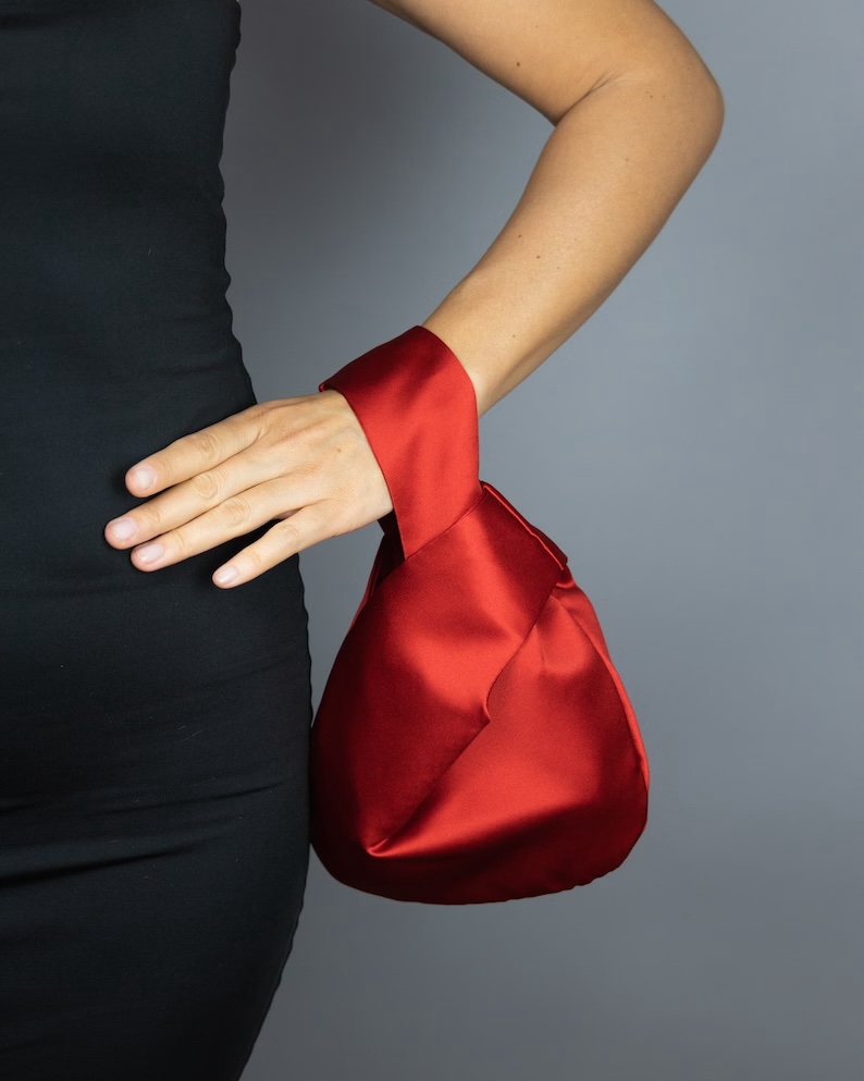 red satin purse japanese knot bag