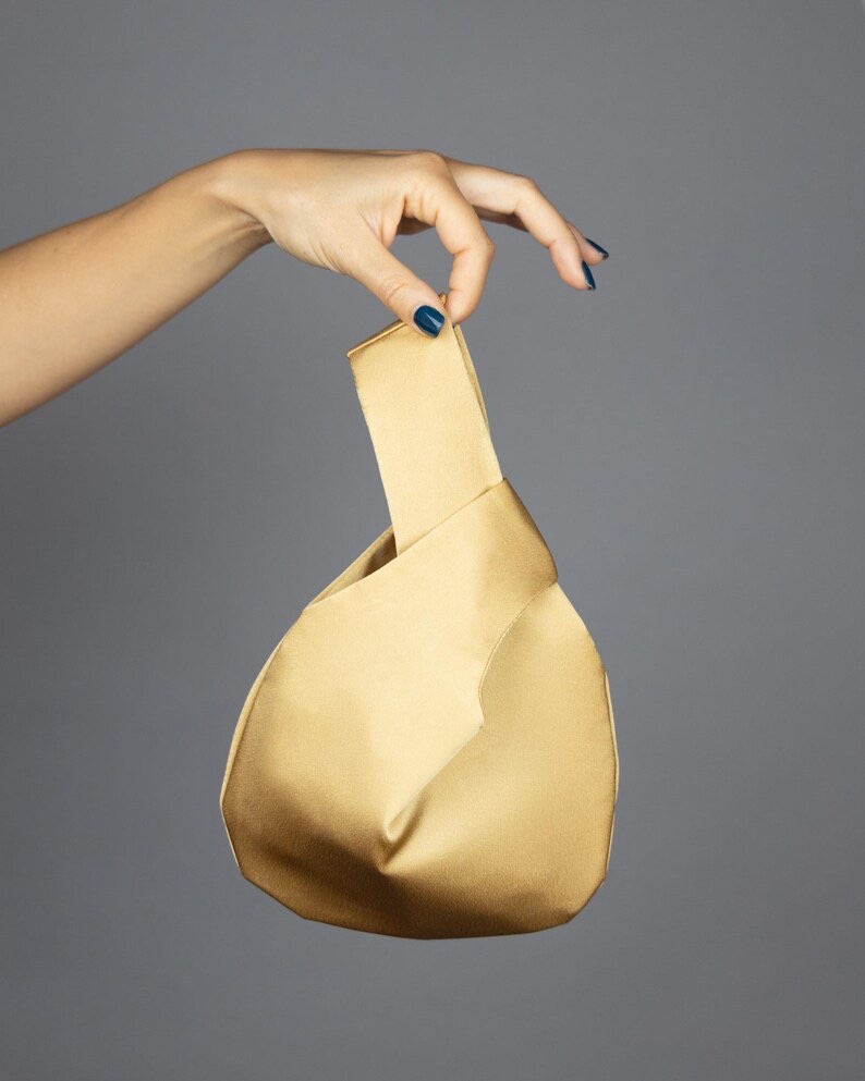 gold satin purse japanese knot bag